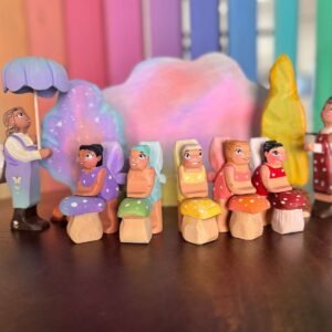 Wooden baby fairy on a Mushroom Toy